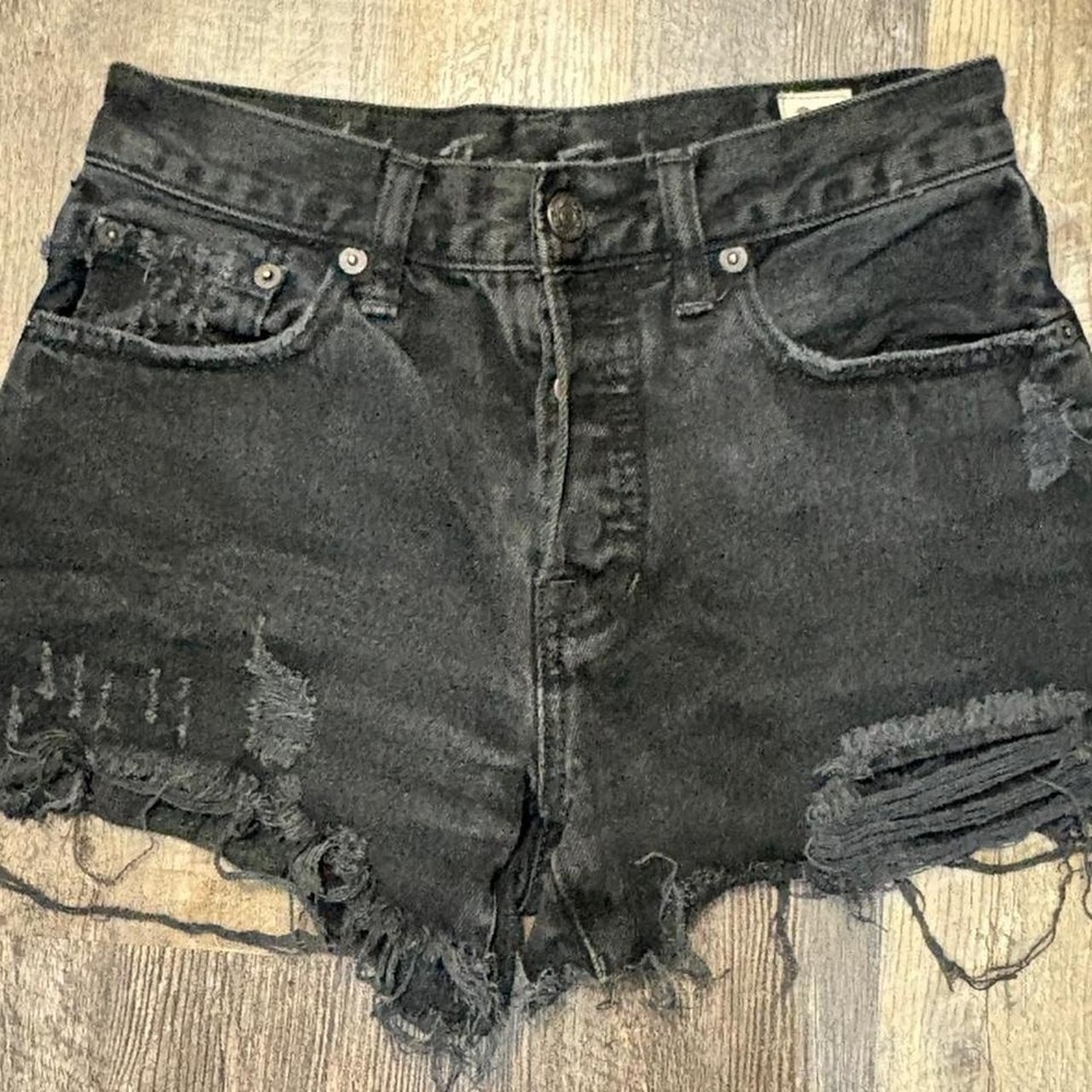 Vintage We The‎ Free Black denim shorts with frayed hem and distressing